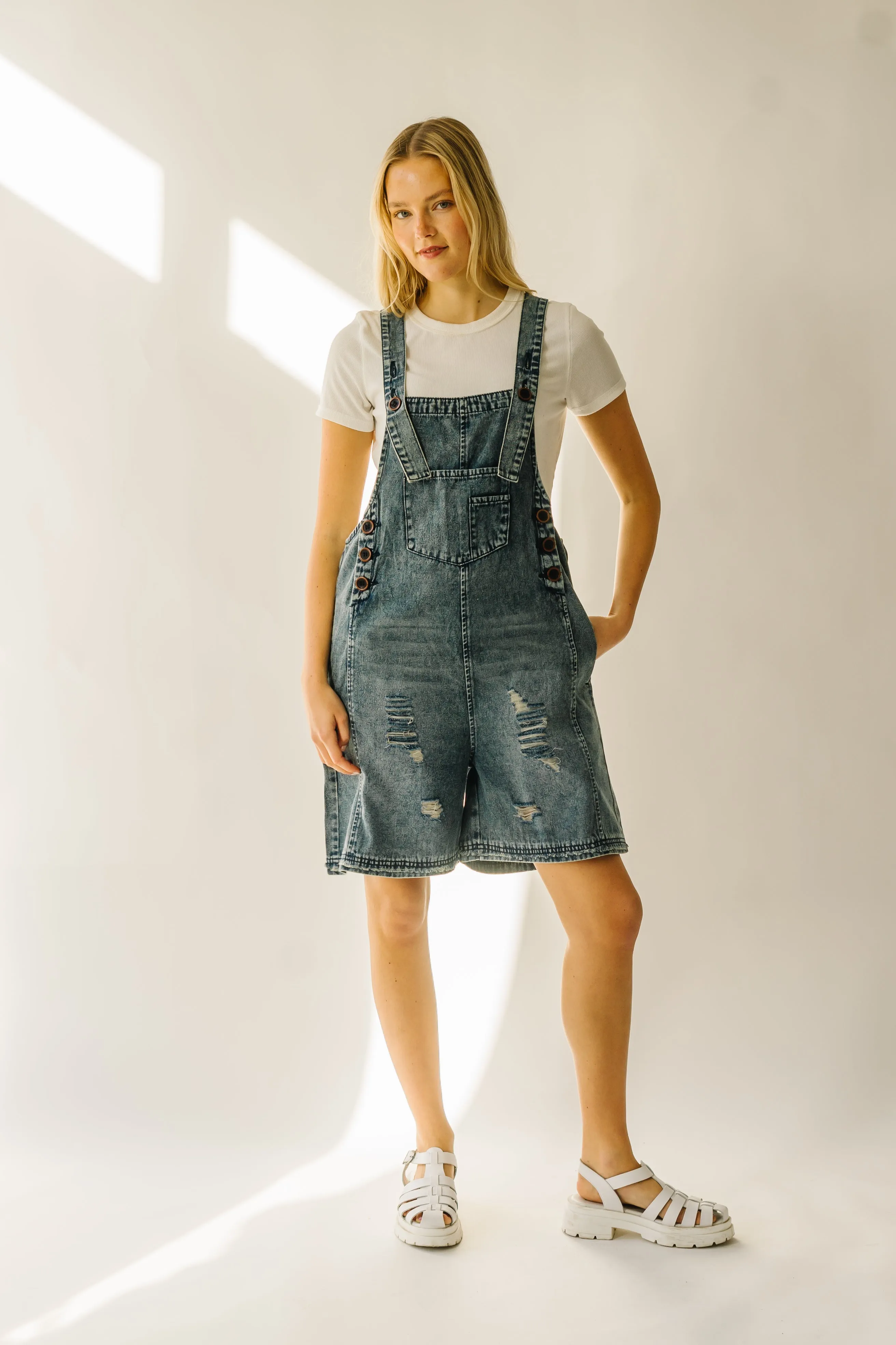 The Dearing Washed Denim Shorts Romper in Vintage Denim