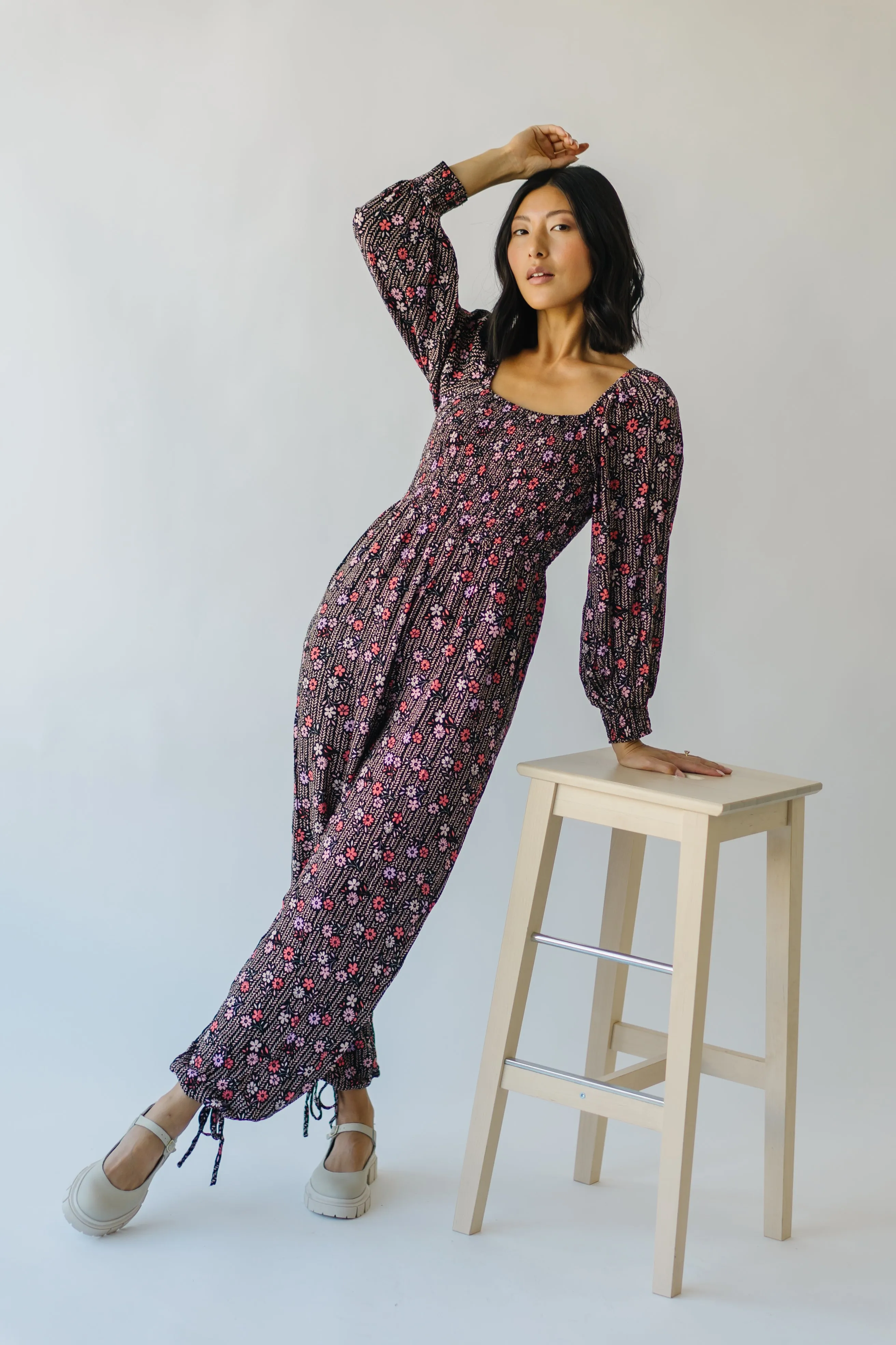 The Ladera Floral Jumpsuit in Black